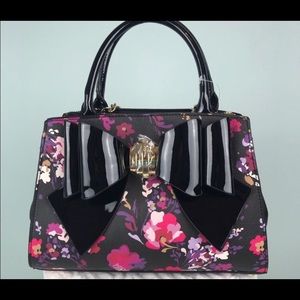 BNWT FLORAL PURSE WITH LARGE SHINY BOW
